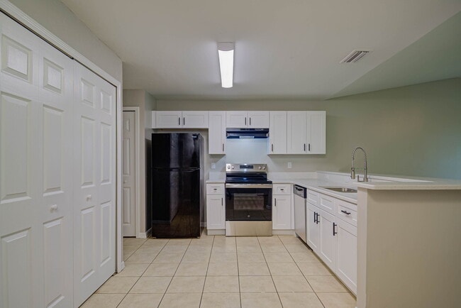 Kitchen with Pantry and Laundry - 704 Ichabod Ave S