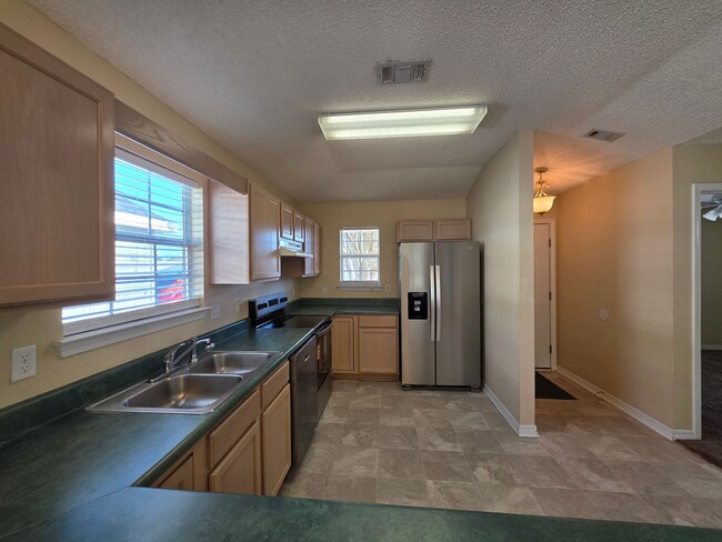 Photo - 2 BR/2BA with Bonus room and fenced yard.