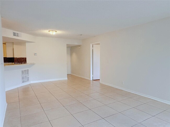Photo - 9055 Wiles Rd Unit 204