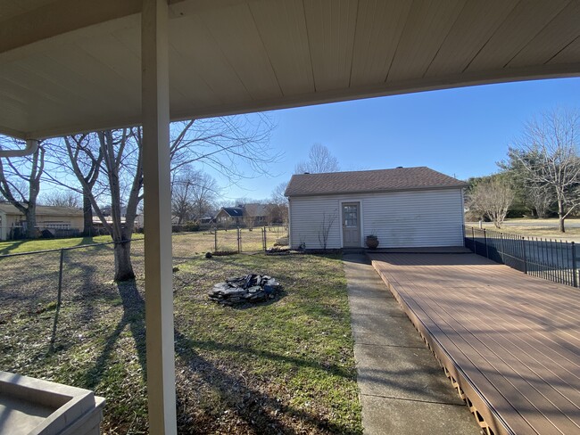 Sidewalk leads to an extra large detached 2 car garage. - 114 Hickory Hills Dr