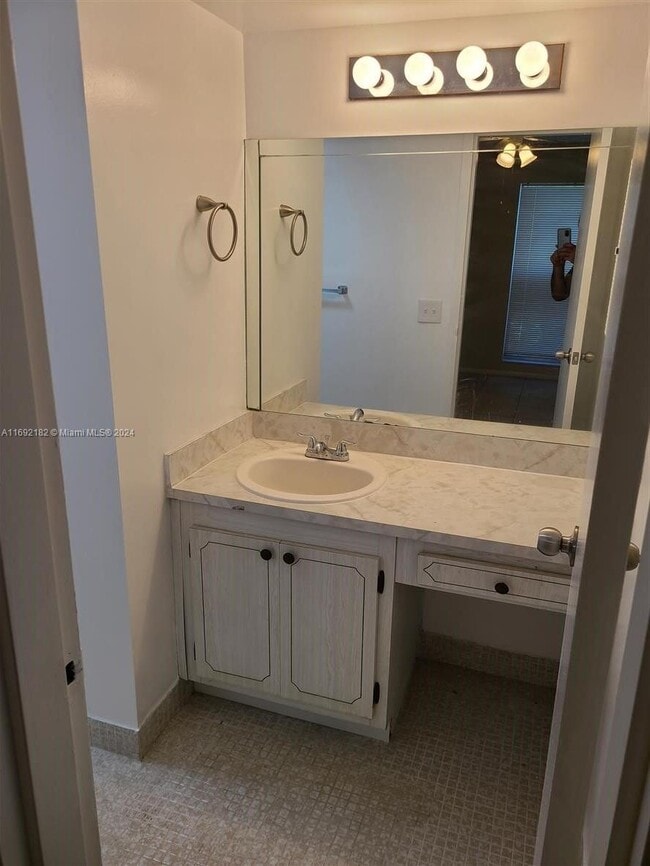 Building Photo - 8411 Lagos de Campo Blvd Unit 303U Rental