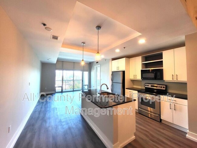 Building Photo - 4561 Olde Perimeter Way Unit 406