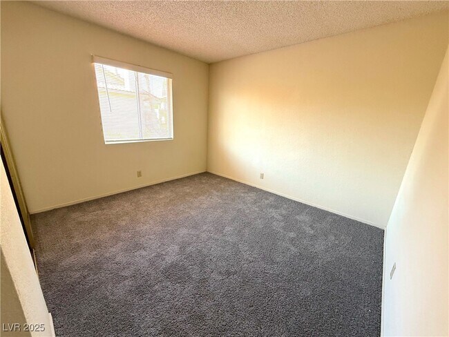Building Photo - 7961 Lions Rock Way Unit 201