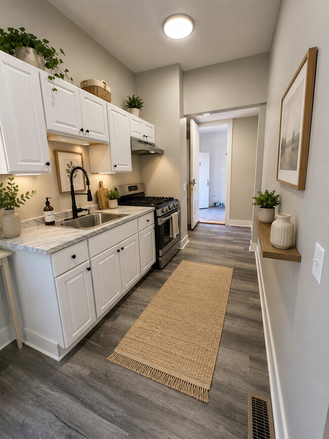 Furniture shown in photos is for staging and demonstration purposes only - 217 Alexander St