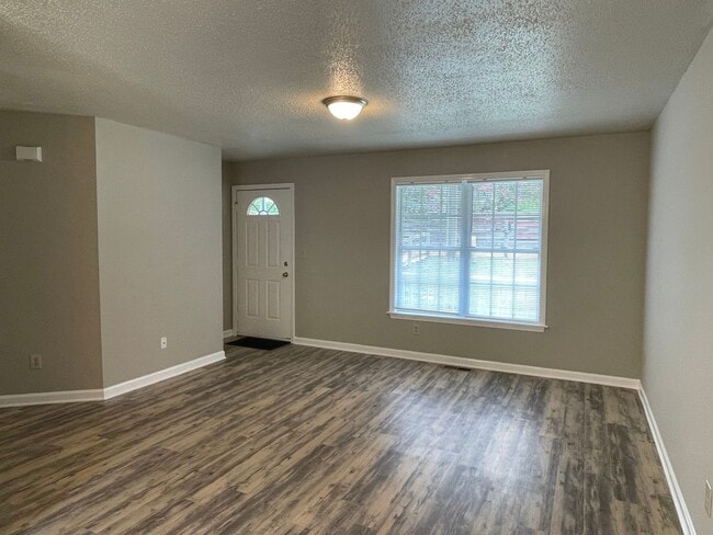 Photo - SW Updated Home - Wood Laminate Flooring, Front Porch & Deck!