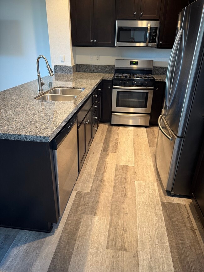 Kitchen with all stainless steel appliances - 1584 Santa Carolina