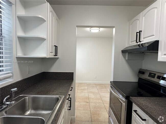 Building Photo - 5841 SW 36th Ct Unit 203 Rental
