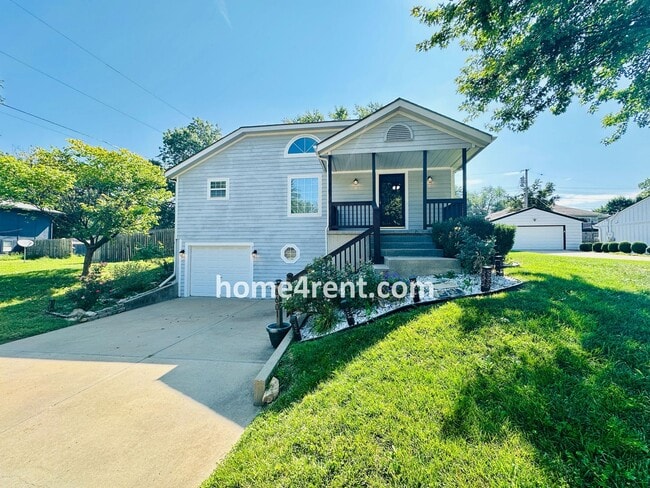 Photo - Overland Park Raised Ranch, Primary Suite on the Main Level, Updated Kitchen and Fenced Yard!