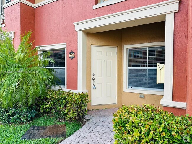 Building Photo - 6120 NW 116 Pl Unit 421 Rental