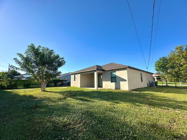Photo - Fenced 3 Bed 2 Bath in SW Cape Coral Available Now!