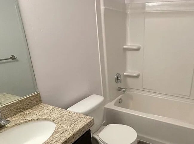 Photo - Spacious 4-Bedroom Home with Finished Basement in Taylorsville