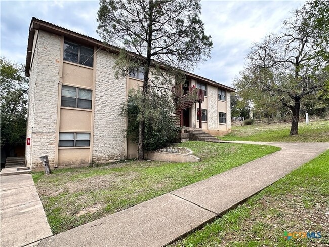 Building Photo - 906 N LBJ Dr Unit 8