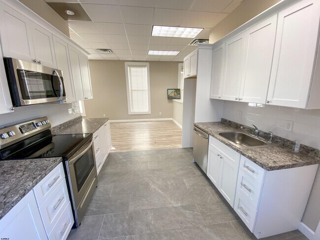 Photo - 6019 Main St Unit 2