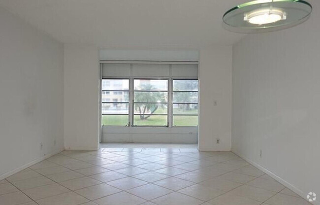 Building Photo - 6650 Royal Palm Blvd Unit 109c Rental