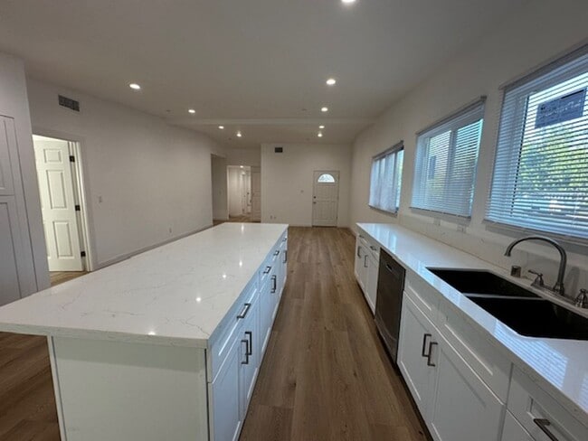 Photo - Completely remodeled 4+2 sprawled across a...