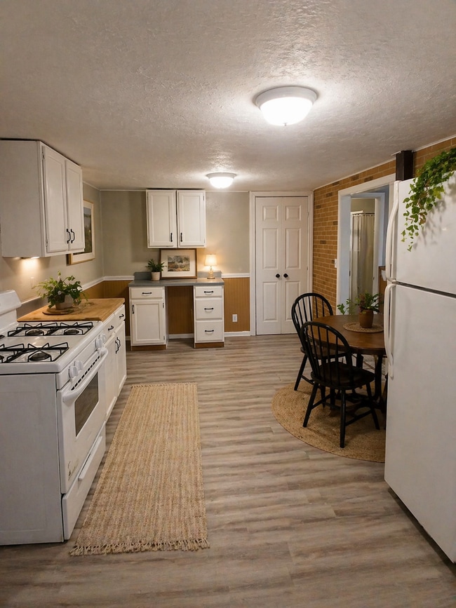 Building Photo - Completely Renovated 3 Bedroom, 2 Full Bathrooms! Front Porch & Detached Garage! 2 Living Rooms!