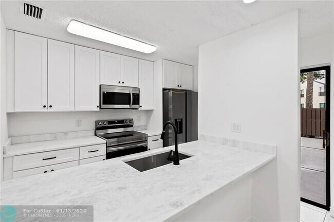 Photo - 3917 Cocoplum Cir