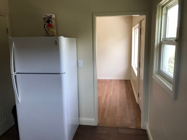 Kitchen into living room - 124 Lewelling Blvd Unit 124