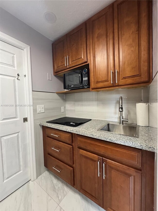 Building Photo - 3316 NW 36th Ave Unit NA