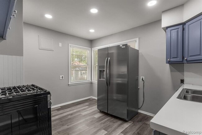 Photo - Cozy & Modern: 2-Bed Brick Home with Garage & Finished Basement
