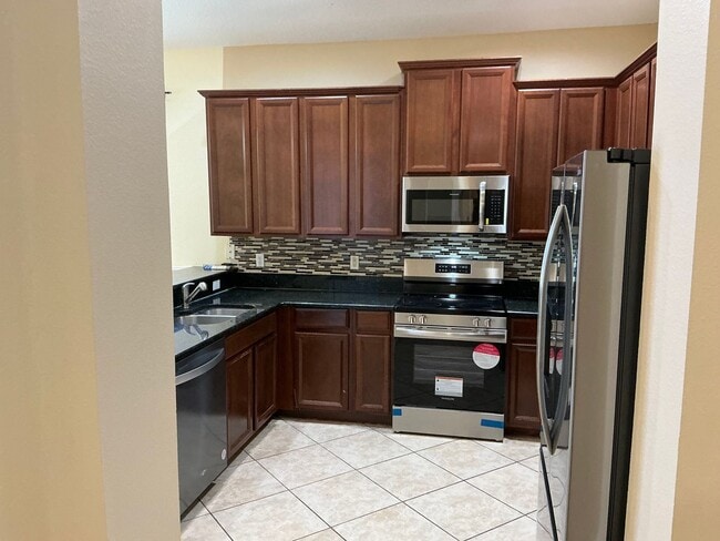 Photo - Florida Living at Its Best: 4 Bed, 3 Bath,...