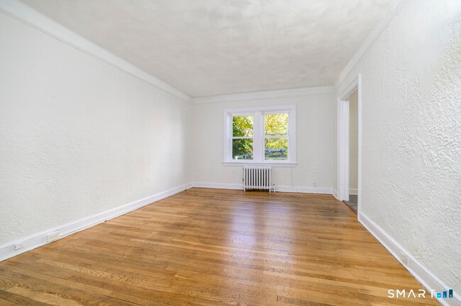 Building Photo - 8 Washington Ct Unit 104