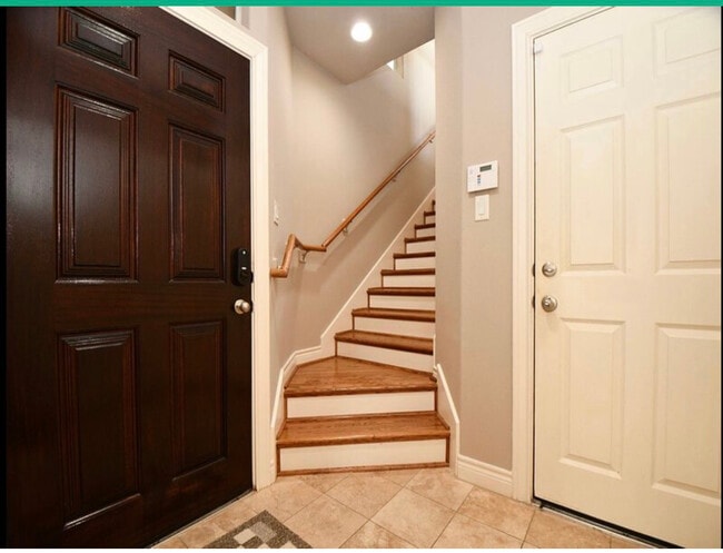 First floor stairway - 9016 Bayview Cove Dr