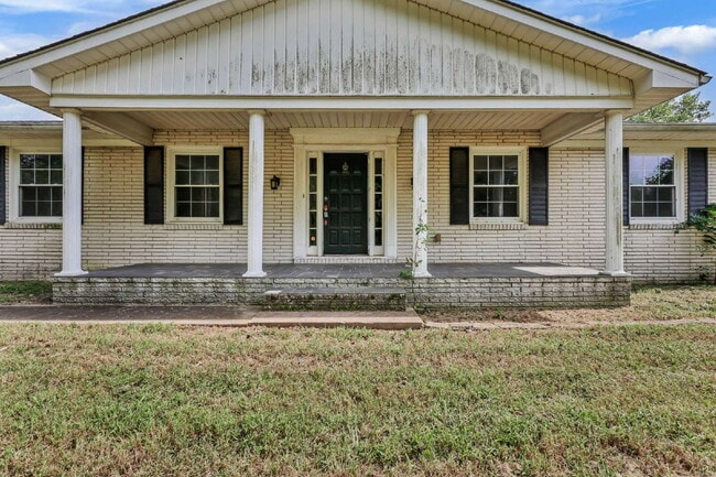Photo - spacious 4-bedroom, 2.5-bath home featuring a 2-car garage and fresh updates throughout.