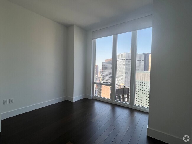 Building Photo - 222 E 44th St Unit 21M Rental