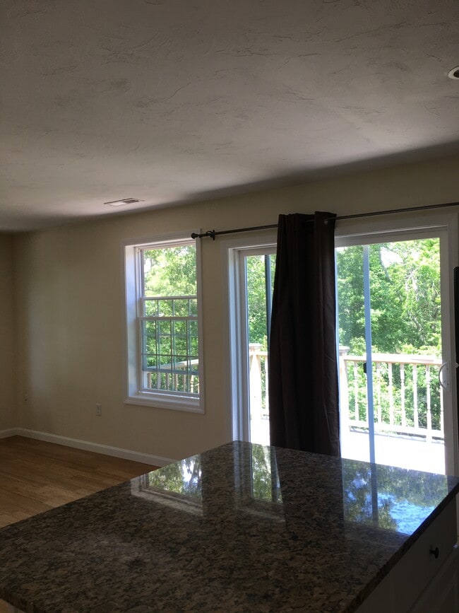 Slider to deck, off Living area and kitchen - 12 Cranberry Rd Unit 1