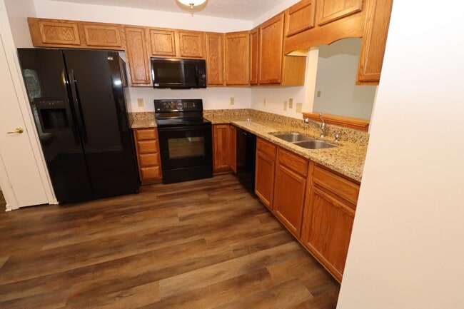 Building Photo - Discover this well-maintained 3-bedroom, 2-bath home in Indianapolis featuring an attached garage...