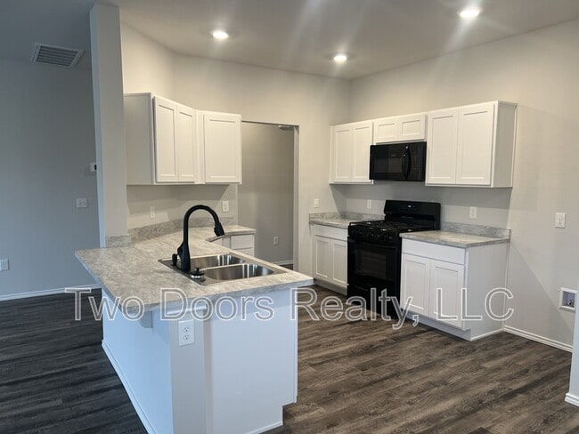 Photo - 606 NW 119th St