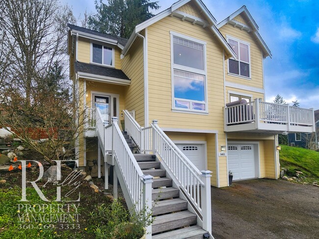 Photo - Light-Filled View Home with Vaulted Ceilings & Warm Wood Finishes