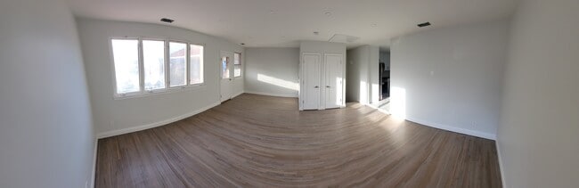 Den/Living with Balcony Access - 2345 E 1st St Apartments Unit #2