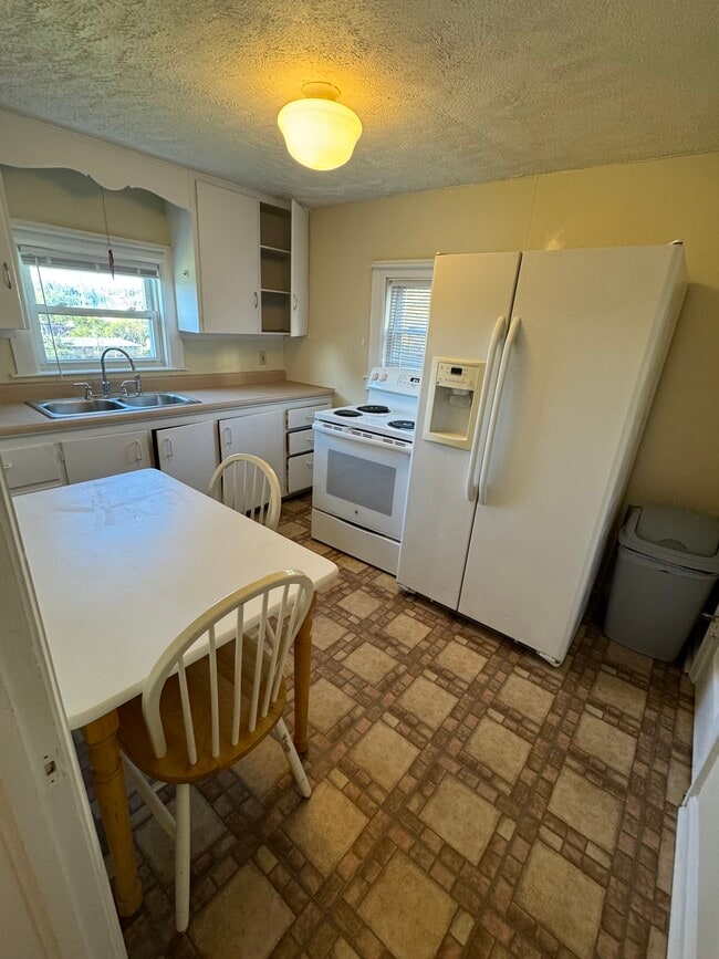 Kitchen with appliances - 48 W Wilson St Unit Apartment B