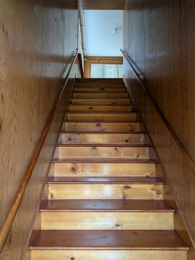 Stairs to upper apartment - 460 N Main St Unit Upper A