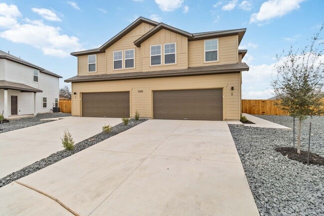 Photo - Brand-New 2-Story Townhome with Large Private Yard & 2-Car Garage