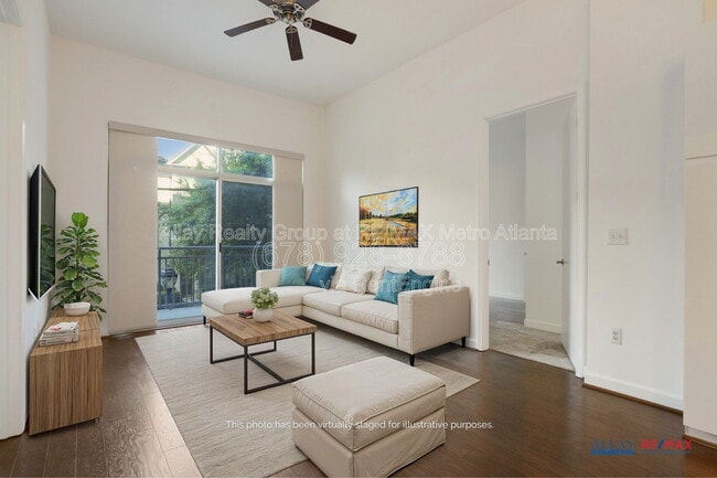 Building Photo - 711 Cosmopolitan Dr NE Unit 105