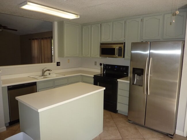 Photo - Duplex Unit w/ Attached Garage, Fenced Yard - Laminate Flooring