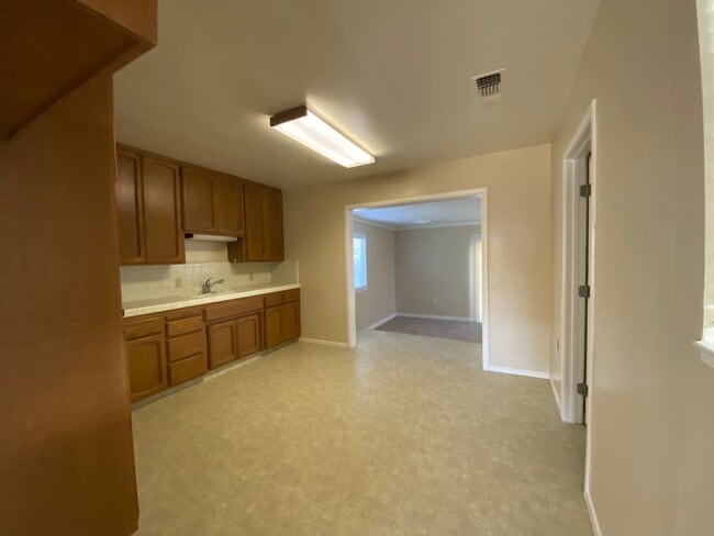 Photo - Action Properties RES Inc offering- Central Roseville - 2 Bed, 1 Bath - Separate Living and Famil...