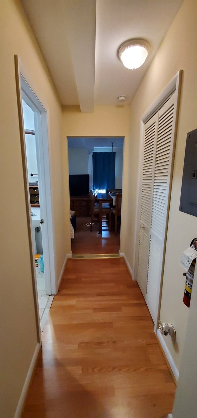 Hallway leading to bedroom - 1106 Olivia St Unit Upstairs Apt