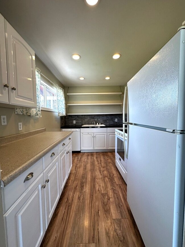 Photo - Cutest 3-Bedroom House with Covered Back Patio + Bonus Storage/Office!