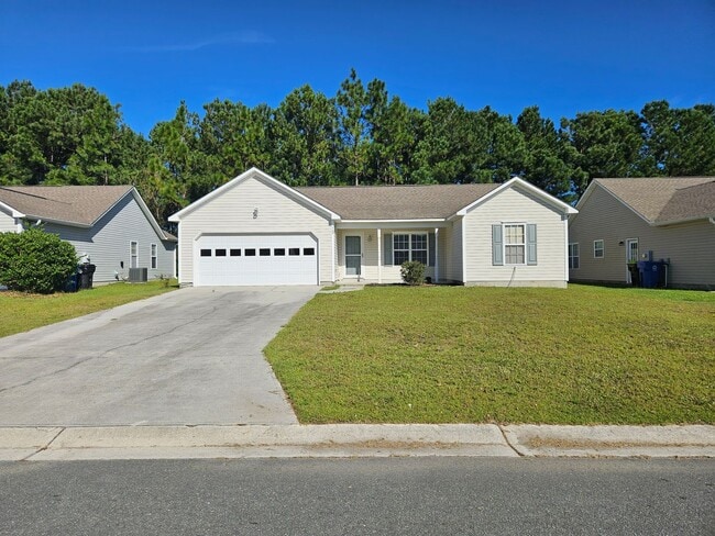 Building Photo - 3 bedroom, 2 bath home in the Neighborhood...