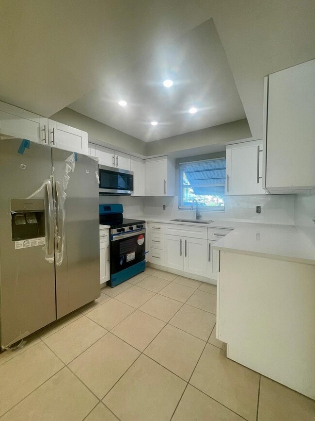 Building Photo - 1480 E Sample Rd Unit 101 Rental
