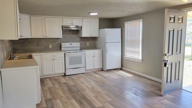 Photo - Fully Updated 2/1 Home Available May 2026