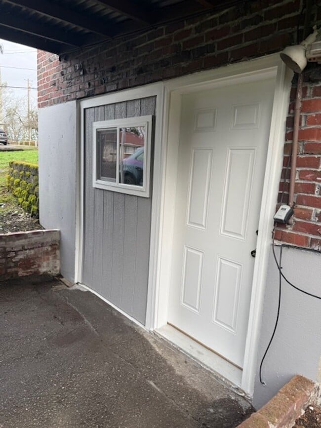 Photo - Davisson Tri-Plex Unidad 10806 Davisson Road SW