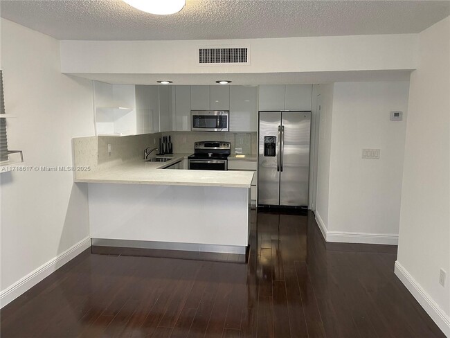 Photo - 8820 SW 132nd Pl Condominio Unidad 208D-S