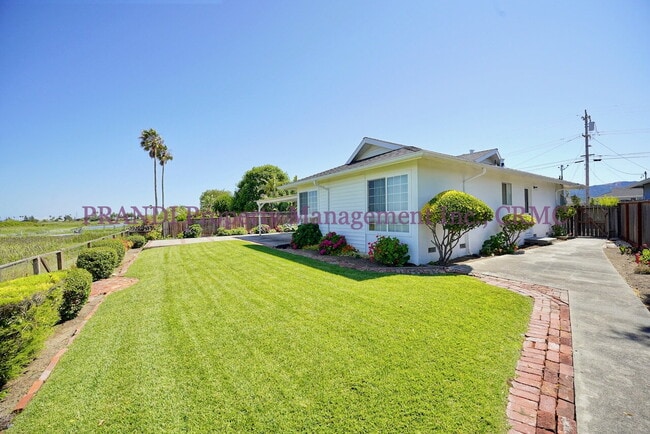 Building Photo - Serene Living on the Water’s Edge – Bright... Rental