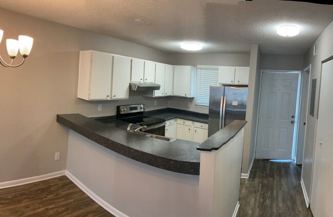 Photo - Just off the main road, but in walking dis...