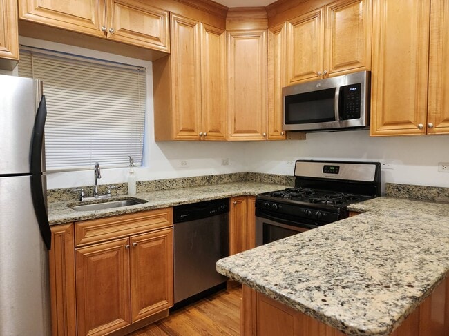 Building Photo - 6645 19th St Unit 1E